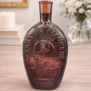 Elegant Purple Glass Bottle with Benjamin Franklin Design